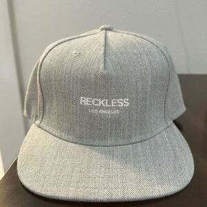 Young & Reckless Grey Snap Back Hat. One size fits all.